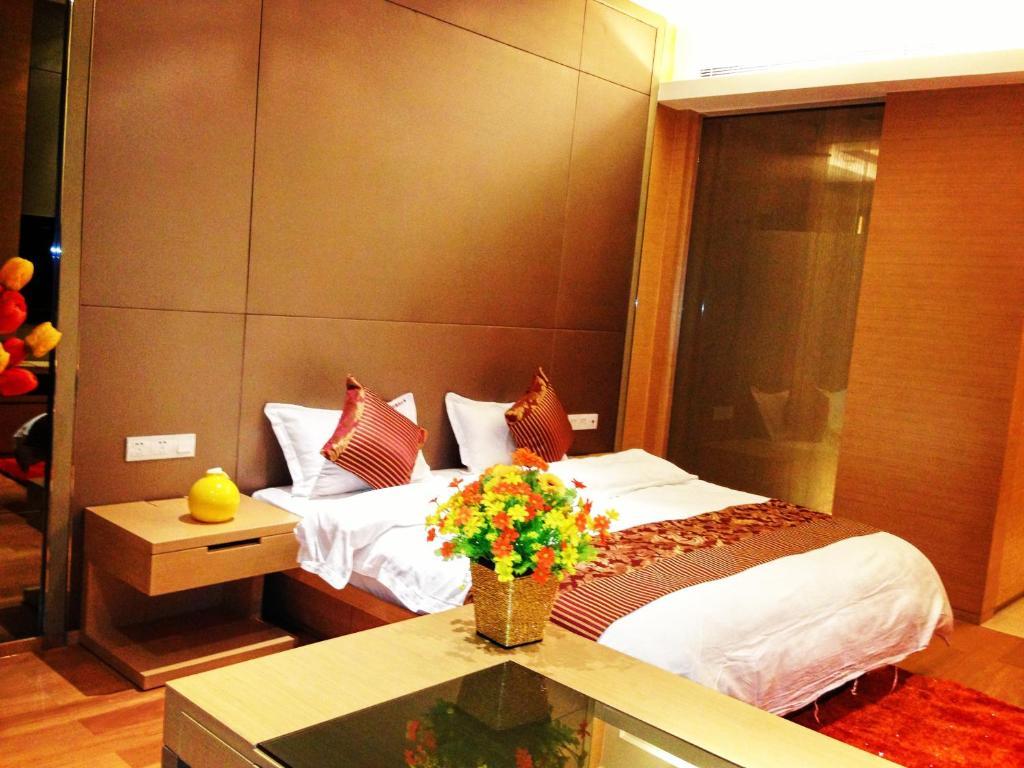 Checkinn International Apartment Гуанджоу Стая снимка