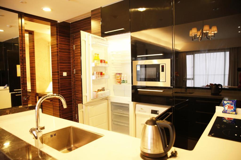 Checkinn International Apartment Гуанджоу Стая снимка